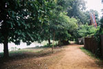 a photograph of western gate to Wat Mongkonsathit next to the Ping River.