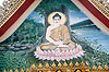 Mural of the Buddha sitting in a lotus