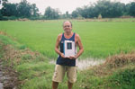 Willard Van De Bogart holding a copy of the book, 